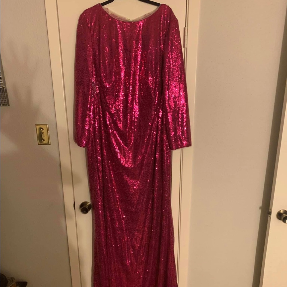 Long sleeved fuchsia gown with illusion lace back